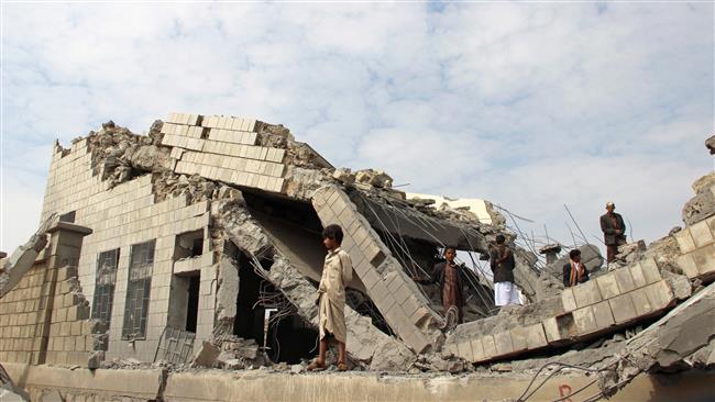 People stand on the rubble of a school destroyed by a Saudi airstrike in an suburb of the northwestern Yemeni city of Sa’ada, September 14, 2016. (Photo by Reuters)