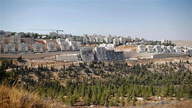 This picture taken on July 29, 2016 shows a general view of an Israeli building site in the illegal settlement of Neve Yaakov, in the northern area of East Jerusalem al-Quds. (Photo by AFP)
