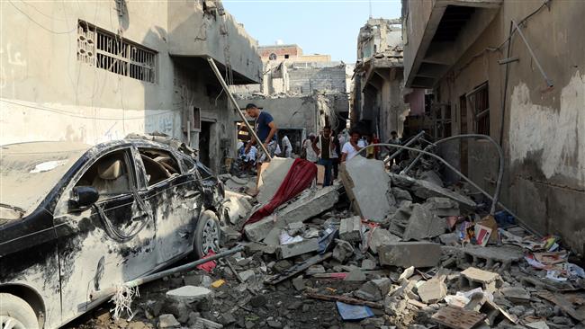 A view shows on September 22, 2016 buildings destroyed during Saudi airstrikes in the Yemeni port city of Hudaydah on the previous day. (Photo by AFP)
