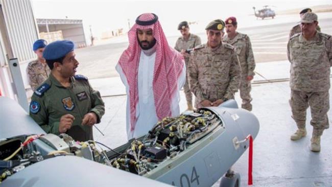 The undated picture by Saudi Press Agency shows Saudi Defense Minister Prince Mohammed bin Salman inspecting a drone during visit to forces in the kingdom’s northern border.