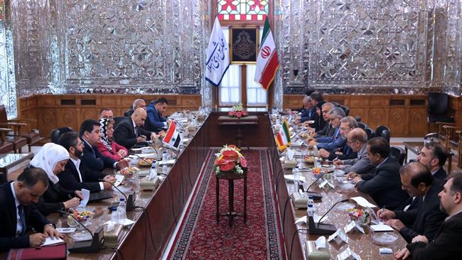 Iranian Parliament Speaker Ali Larijani (6th R) and his Syrian counterpart Hadiya Khalaf Abbas (5th L) preside over a meeting in Tehran on September 26, 2016. (Photo by IRNA)
