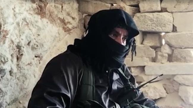This still image from footage provided by a German journalist purportedly shows a commander of the Jabhat Fateh al-Sham militant group, formerly known as al-Nusra Front, who was interviewed by German-language daily Kölner Stadt-Anzeiger. (Via RT)
