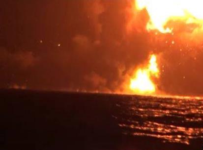 This grab shows an Emirati military vessel in flames after being targeted by Yemeni forces off the coast of the Red Sea port city of Mokha, southwestern Yemen, early on October 1, 2016.