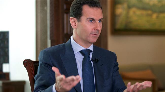 This photo released by the Syrian Presidency shows President Bashar al-Assad speaking to The Associated Press at the presidential palace in the capital, Damascus, September 21, 2016. (Via AP)
