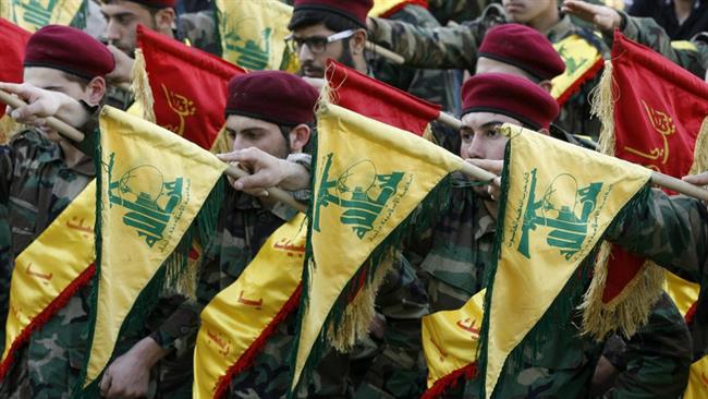 File photo shows members of the Lebanese resistance movement, Hezbollah.
