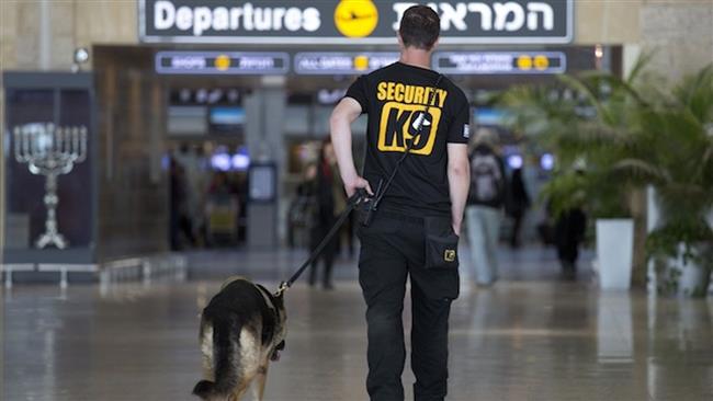 A security guard and his dog at an Israeli airport in the occupied Palestinian territories (file photo)
