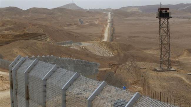 The file photo released in the Israeli media shows a border fence separating the occupied Palestinian territories from Egypt