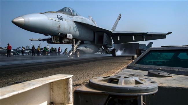 US Navy photo obtained on October 25, 2016 shows an F/A-18E Super Hornet as it launches from the flight deck of an aircraft carrier deployed in the Persian Gulf. (Via AFP)