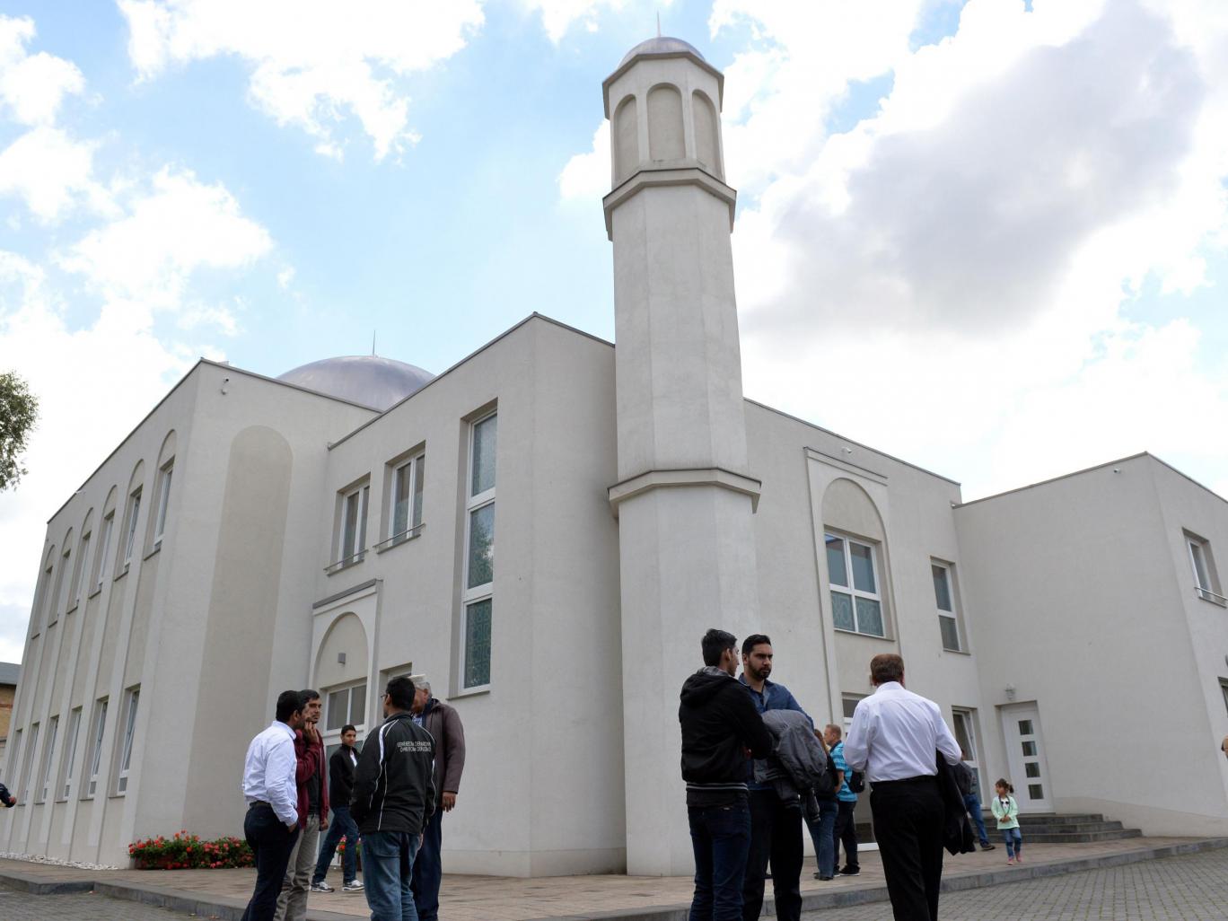 People stand in front of the Khadija mosque in Berlin Getty
