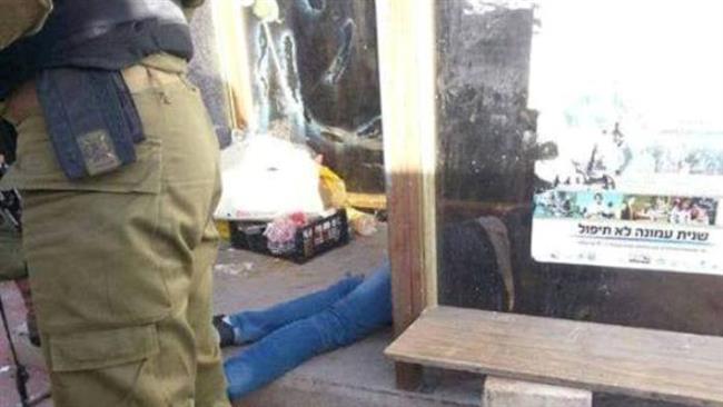 Israeli troops stand guard after they shoot dead a Palestinian near the illegal West Bank settlement of Ofra on November 03, 2016. 