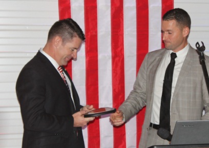 Oklahoma state representative John Bennett (left) accepts National Defender of Freedom award. (screenshot from CSP website)
