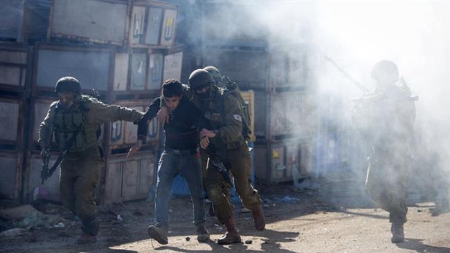 This file photo shows Israeli soldiers arresting a Palestinian protester in the West Bank village of Kabatiya, near Jenin, on February 4, 2016. (By AP)