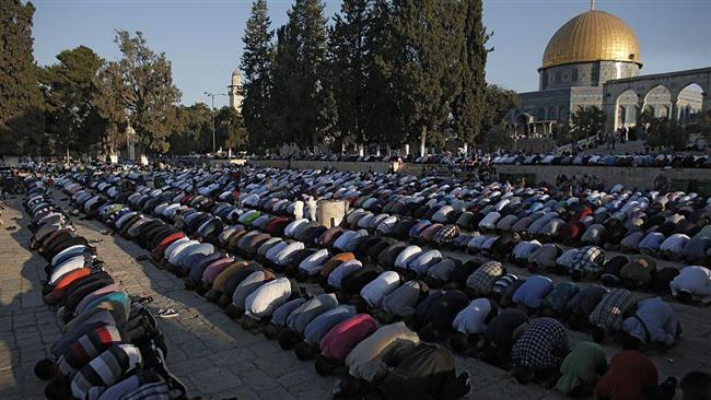 Palestinian Muslim worshippers praying at the al-Aqsa Mosque compound in East Jerusalem al-Quds