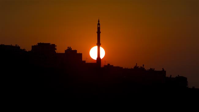 The minaret of a mosque is seen in the city of Ramallah in the Israeli-occupied West Bank, on July 16, 2015.
