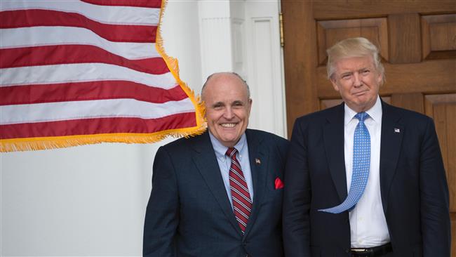 US President-elect Donald Trump meets with former New York City Mayor Rudy Giuliani at the clubhouse of Trump National Golf Club November 20, 2016 in Bedminster, New Jersey. (Photo by AFP)
