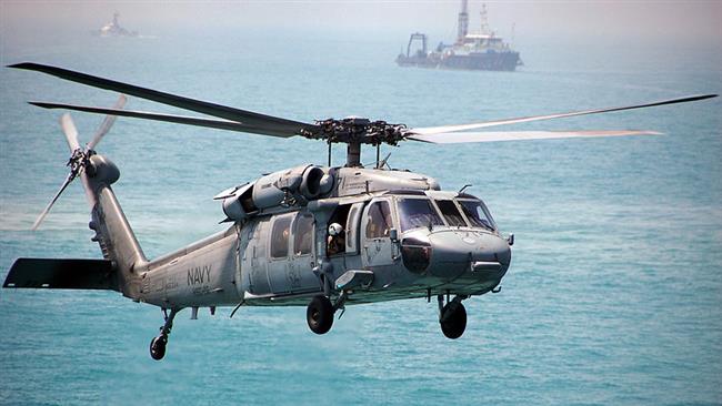 The file photo shows an MH-60 Sea Hawk helicopter
