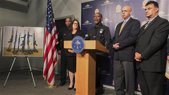 Los Angeles Police Commander Horace Frank, third from left, speaks at the Islamic Center of Southern California during a police news conference Tuesday, October 25, 2016 in Los Angeles. (Photo by AP)
