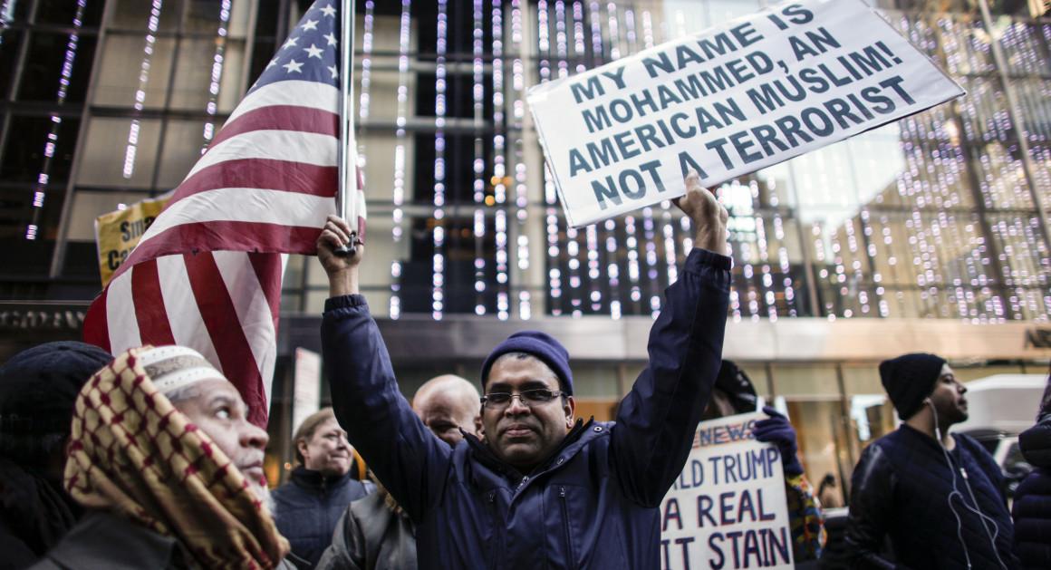 A group of Muslims attend a rally in front of Trump Tower.