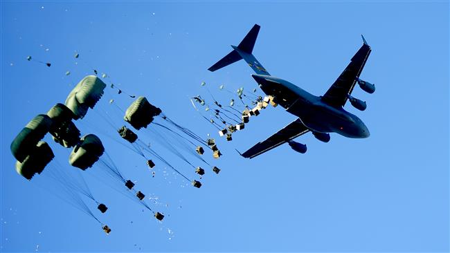 The undated file photo shows a US Air Force C-17 Globemaster III aircraft dropping supply packages.
