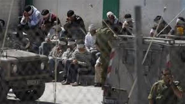 Blindfolded Palestinians at an Israeli detention center