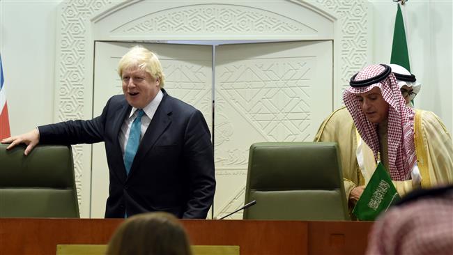 Saudi Minister of Foreign Affairs Adel al-Jubeir (R) and British Secretary of State for Foreign and Commonwealth Affairs Boris Johnson (L) arrive for a joint press conference, in Riyadh