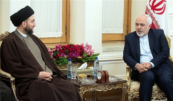 Iranian Foreign Minister Mohammad Javad Zarif in a meeting with head of the Islamic Supreme Council of Iraq Ammar al-Hakim in Tehran