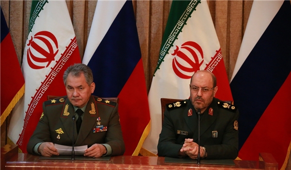 Iranian Defense Minister Hossein Dehqan and his Russian counterpart Sergei Shoigu