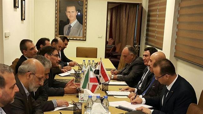 Secretary of Iran’s Supreme National Security Council Ali Shamkhani (4th L) and the head of Syria’s National Security Bureau, Major General Ali Mamlouk (2nd R) meet in Damascus on January 8, 2017. (Photo by Tasnim News Agency)
