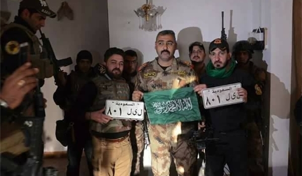 Saudi Flags, Car Registration Plates Found in ISIL Bases in Mosul
