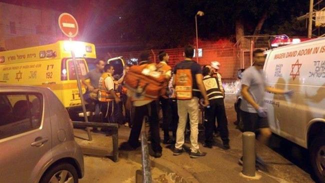 Handout photo shows Israeli ambulances at the scene of a shooting when Israeli forces killed a Palestinian man for alleged stabbing attack at a checkpoint near the city of Tulkarem, Tuesday, January 17, 2016.