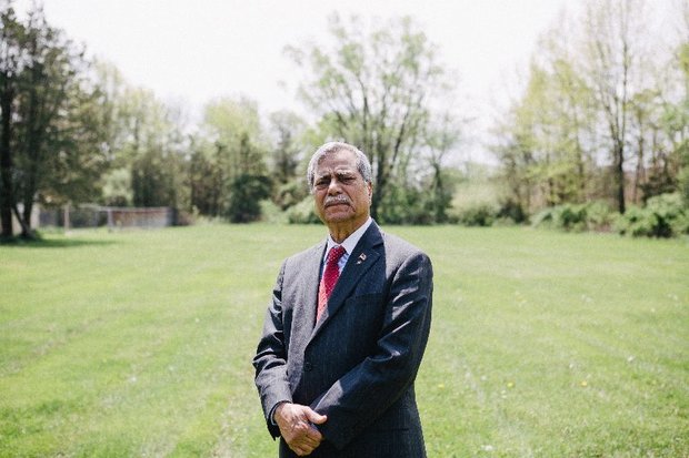 Mohammad Ali Chaudry, president of the local Islamic Society, on a property where it wanted to build a mosque