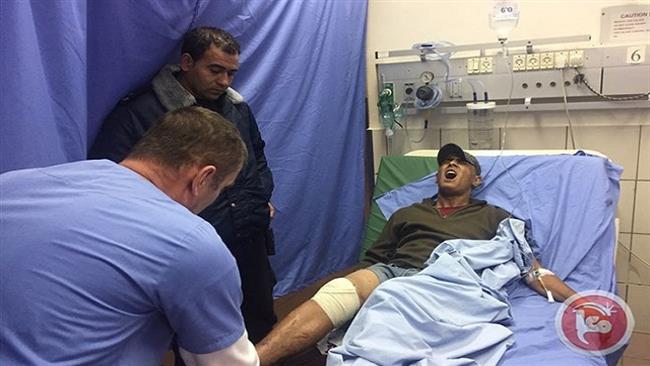 Injured Palestinian teenager Yahya Omar Ali Sarhan reacts as his gunshot wound is treated at a hospital in the city of Tulkarm, in the northern West Bank, January 31, 2017.