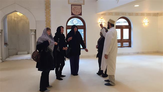 People of other faiths tour Noor Mosque in Gloucester, Britain