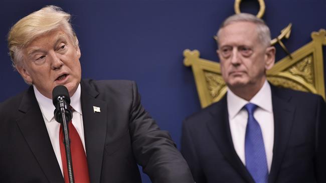 US President Donald Trump speaks following the ceremonial swearing-in of James Mattis (R) as secretary of defense on January 27, 2016 at the Pentagon in Washington, DC. (Photo by AFP)
