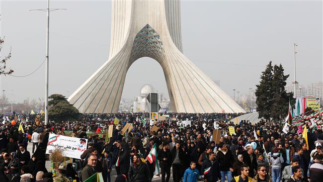 Iranians take part in a rally marking the anniversary of the 1979 Islamic revolution on February 10, 2017, in the capital Tehran. (Photo by AFP)
