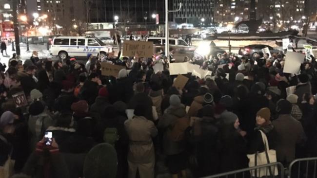 People gather in New York City on February 10, 2017, to protest raids by Immigration and Customs Enforcement (ICE) this week.
