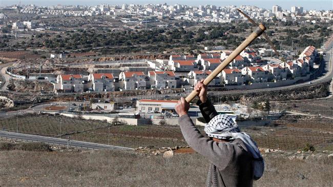 A picture taken from the West Bank city of al-Khalil (Hebron) on February 7, 2017 shows a view of the Kiryat Arba illegal settlement on the outskirts of the Palestinian city. (Photo by AFP)