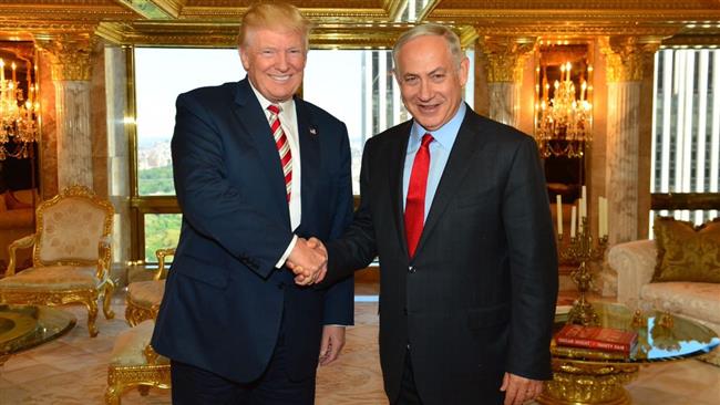 Israeli Prime Minister Benjamin Netanyahu (R) and Donald Trump shake hands during a meeting at the Trump Tower in New York on September 25, 2016.
