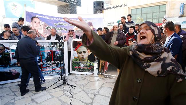 A Palestinian woman reacts during a protest following a verdict in the trial of the Israeli soldier Elor Azaria who in March 2016 shot dead a wounded Palestinian in the occupied West Bank city of Hebron, on February 21, 2017 (Photo by AFP).

