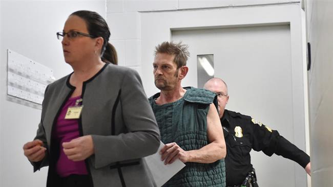 Adam Purinton, 51, accused of killing an Indian software engineer, is shown in closed circuit TV in court from the Johnson County detention center as Purinton heads towards a room with his public defender, Michelle R. Durrett (L) during his initial court appearance in Olathe, Kansas, February 27, 2017. (Photo by Reuters)