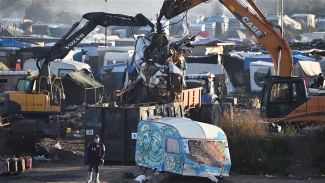 French authorities demolish Calais refugee camp in northern France, October 27, 2016. (Photo by AFP)
