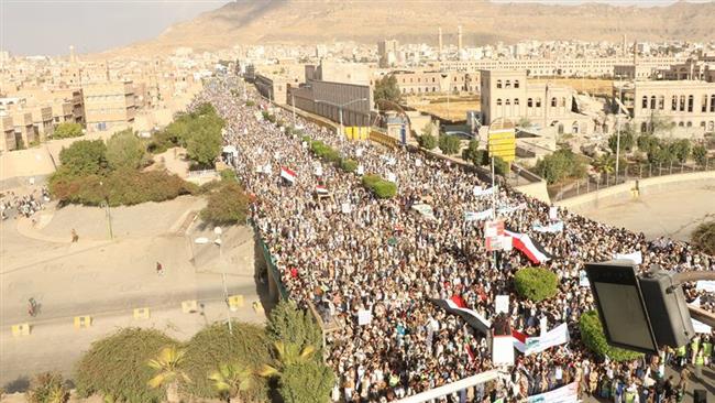 People take part in a demonstration, under the motto “Tough against Disbelievers”, in the Yemeni capital city of Sana’a on March 3, 2017 to denounce the Saudi military campaign against their country.
