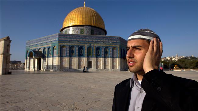 A Palestinian muezzin calling for prayer from the al-Aqsa mosque compound in East Jerusalem al-Quds.