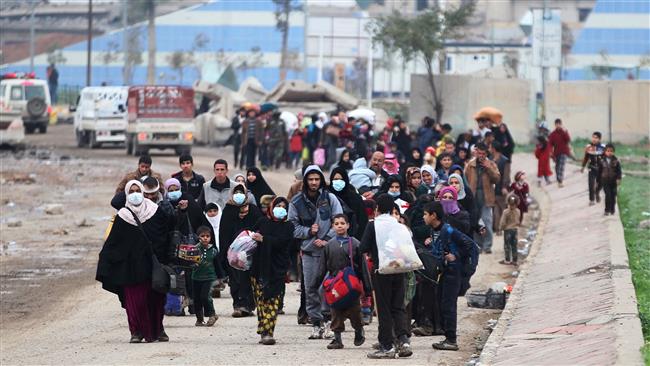 Iraq Mosul People Flee from ISIL held areas