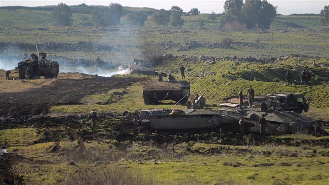 Israeli soldiers take part in a military training in the Israeli-occupied Golan Heights, near the border with Syria on February 21, 2017. (Photo by AFP)
