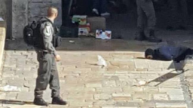 The body of a Palestinian woman shot dead by Israeli forces in the Old City of occupied East Jerusalem al-Quds