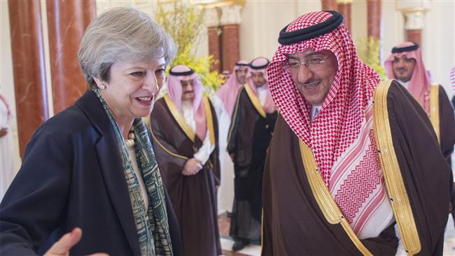 Saudi Crown Prince Mohammad bin Nayef bin Abdulaziz Al Saud (R) meets with British Prime Minister Theresa May in the capital Riyadh, April 4, 2017. (Photo by AFP)
