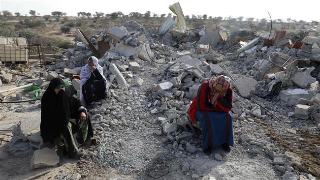 Palestinian Women Mourn Over Their Demolished Houses by Israel