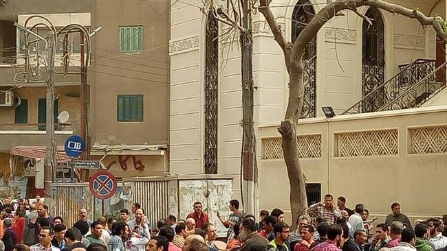 A crowd outside a church in the Egyptian Nile delta city of Tanta after a deadly blast.