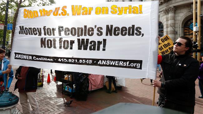 Demonstrators protest US military involvement in the Syrian war in San Francisco, California, on April 7, 2017.  (Photo by AFP)
